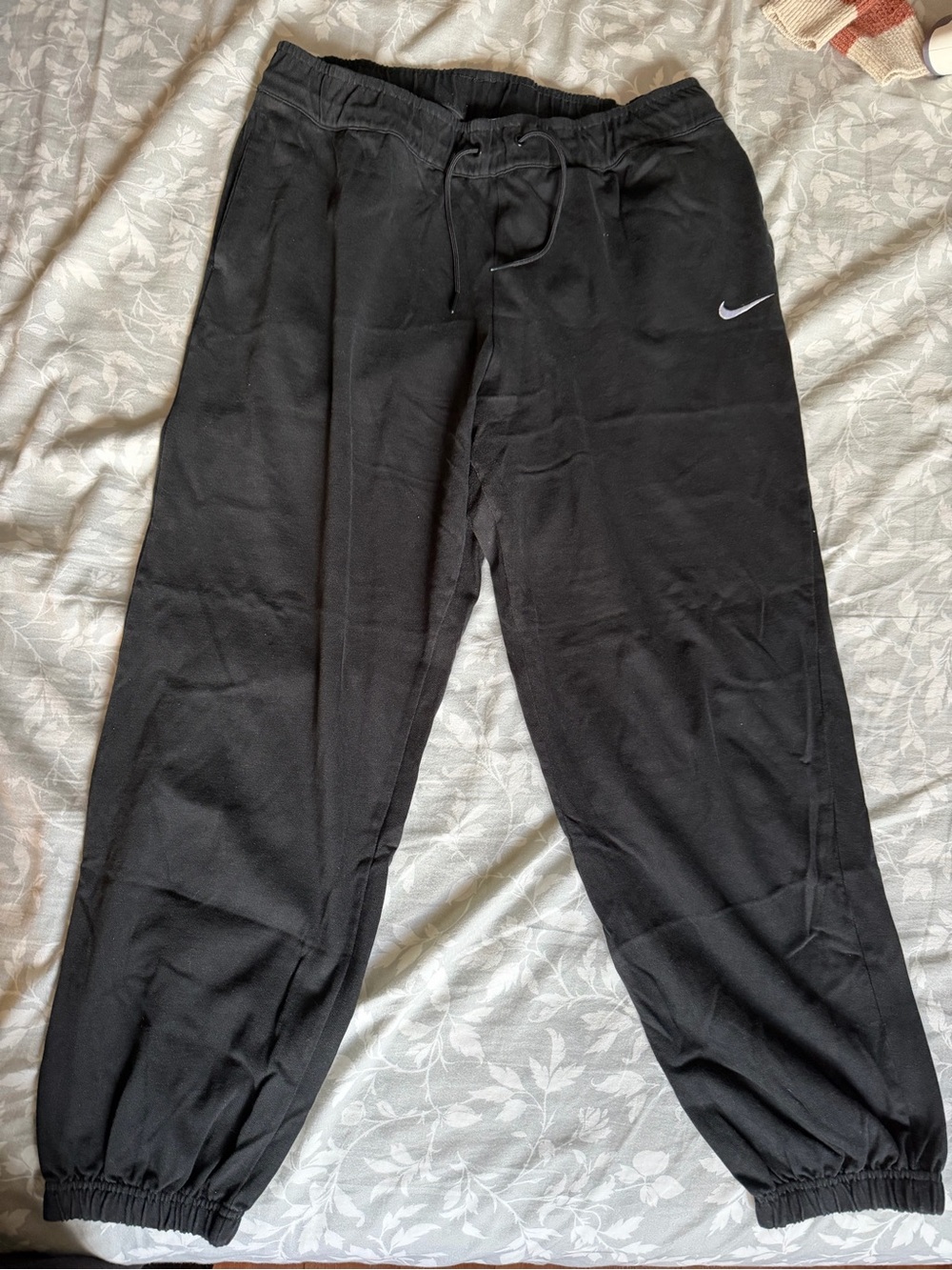 Nike Black Joggers with White Swoosh